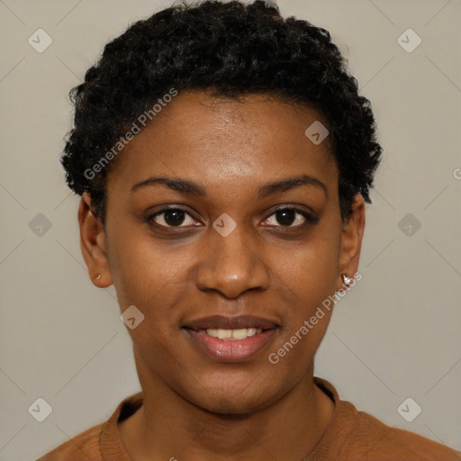 Joyful black young-adult female with short  black hair and brown eyes