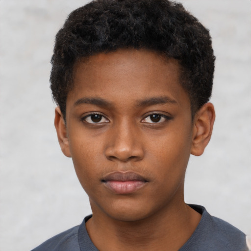 Neutral black child male with short  black hair and brown eyes