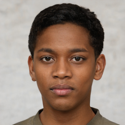 Neutral black young-adult male with short  black hair and brown eyes