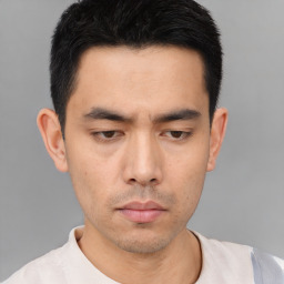 Neutral asian young-adult male with short  brown hair and brown eyes