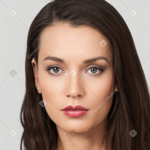 Neutral white young-adult female with long  brown hair and brown eyes