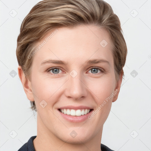 Joyful white young-adult female with short  brown hair and grey eyes