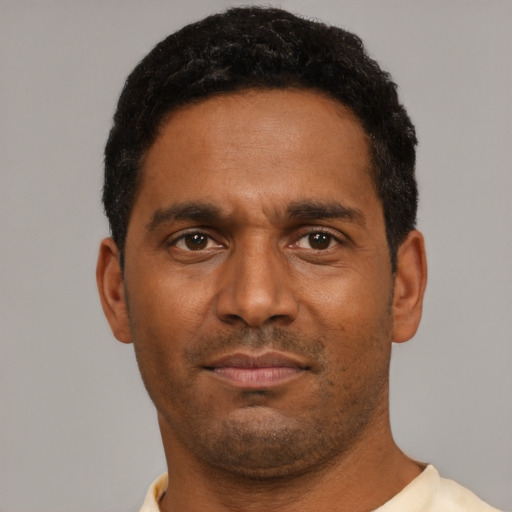 Neutral black young-adult male with short  black hair and brown eyes