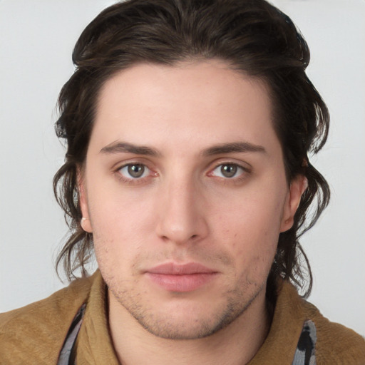 Neutral white young-adult male with medium  brown hair and brown eyes