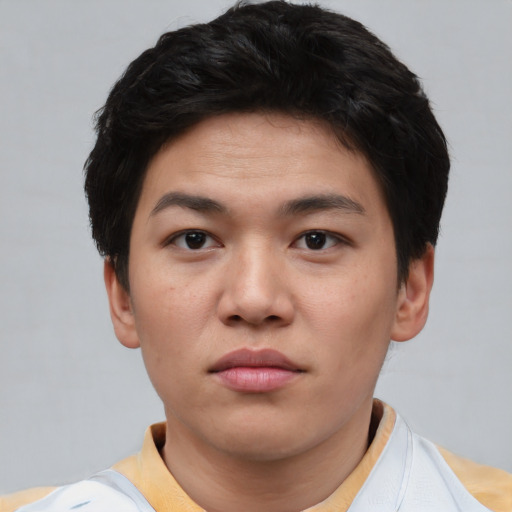 Neutral asian young-adult male with short  brown hair and brown eyes