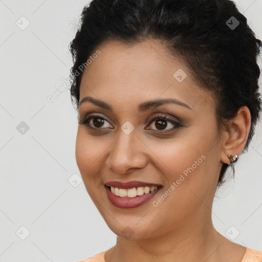 Joyful latino young-adult female with short  brown hair and brown eyes