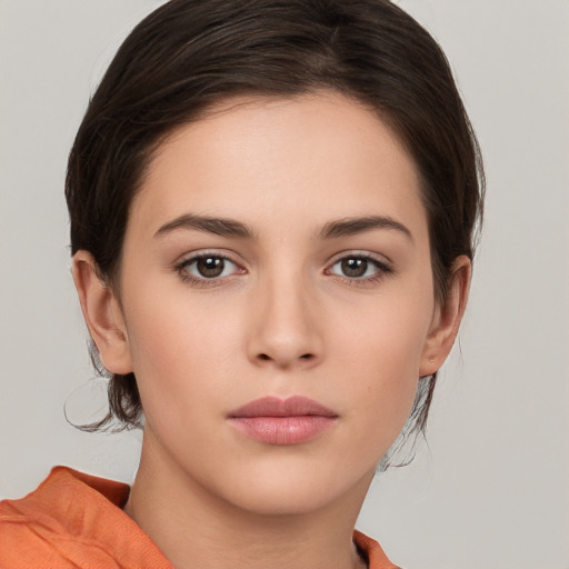 Neutral white young-adult female with medium  brown hair and brown eyes