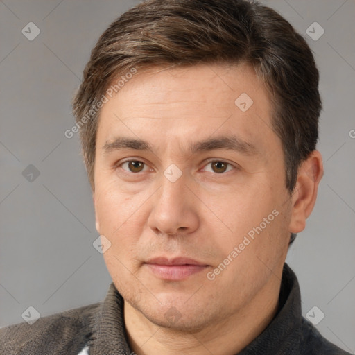 Neutral white adult male with short  brown hair and brown eyes