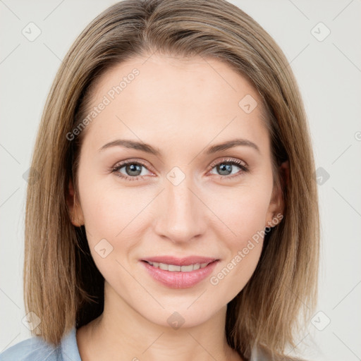 Joyful white young-adult female with medium  brown hair and blue eyes