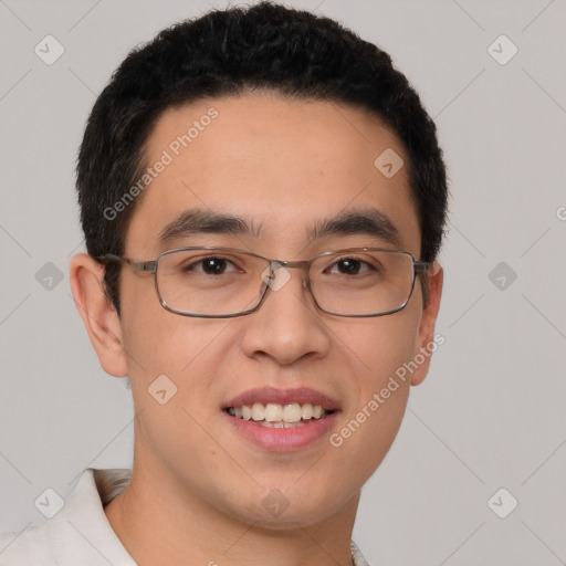 Joyful asian young-adult male with short  brown hair and brown eyes