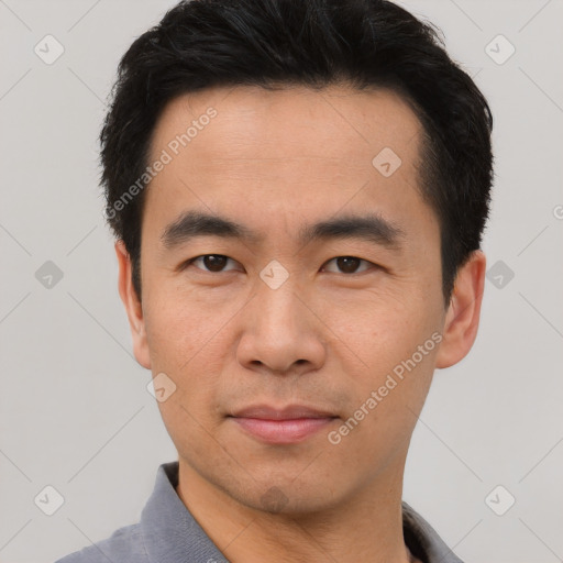 Neutral asian young-adult male with short  black hair and brown eyes