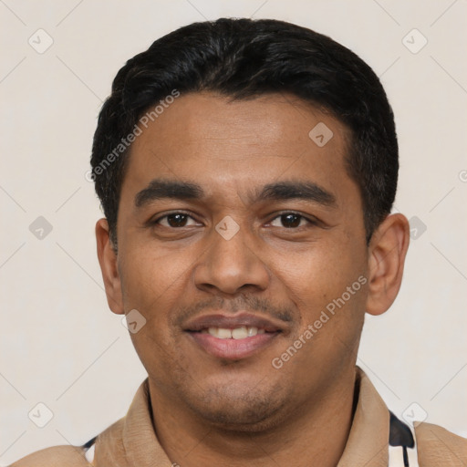 Joyful latino young-adult male with short  black hair and brown eyes