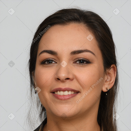 Joyful white young-adult female with medium  brown hair and brown eyes