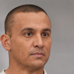 Neutral white adult male with short  brown hair and brown eyes