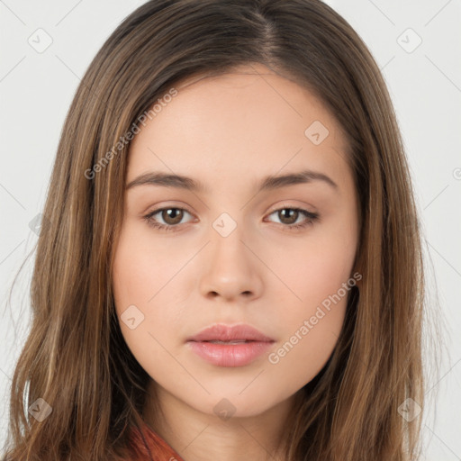 Neutral white young-adult female with long  brown hair and brown eyes