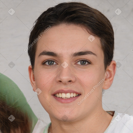 Joyful white young-adult female with short  brown hair and brown eyes