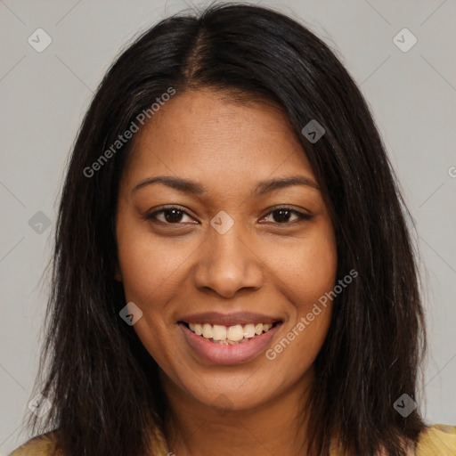 Joyful black young-adult female with long  brown hair and brown eyes