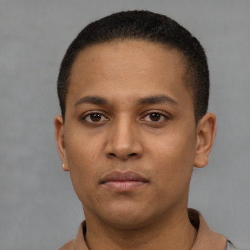 Neutral latino young-adult male with short  brown hair and brown eyes