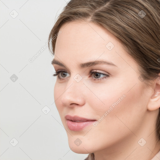 Neutral white young-adult female with medium  brown hair and grey eyes