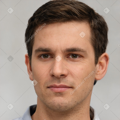 Neutral white young-adult male with short  brown hair and grey eyes