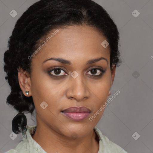 Joyful black young-adult female with medium  brown hair and brown eyes