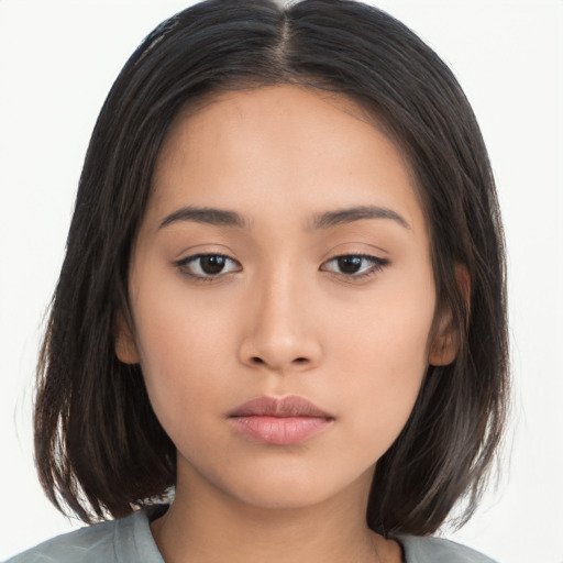 Neutral asian young-adult female with long  brown hair and brown eyes