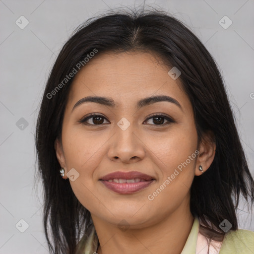 Joyful asian young-adult female with long  brown hair and brown eyes