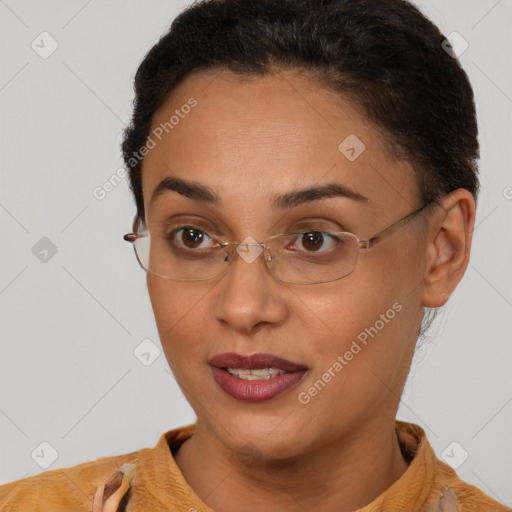 Joyful black young-adult female with short  brown hair and brown eyes