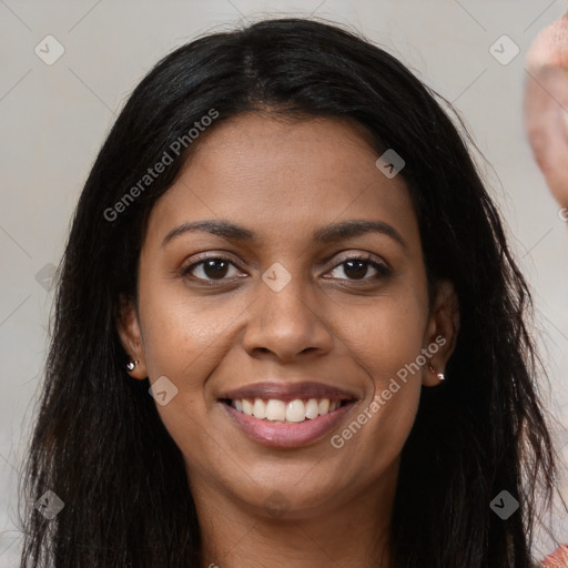 Joyful latino young-adult female with long  brown hair and brown eyes