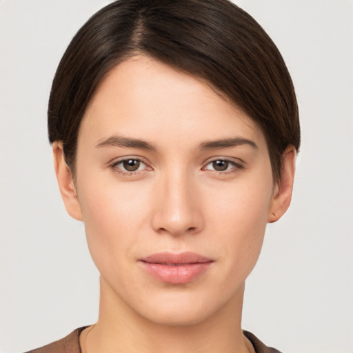 Neutral white young-adult female with short  brown hair and brown eyes