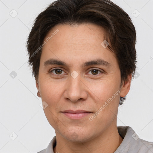 Joyful white adult male with short  brown hair and brown eyes