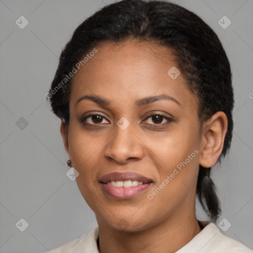 Joyful latino young-adult female with short  black hair and brown eyes