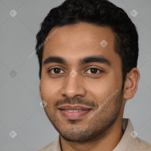 Joyful latino young-adult male with short  black hair and brown eyes