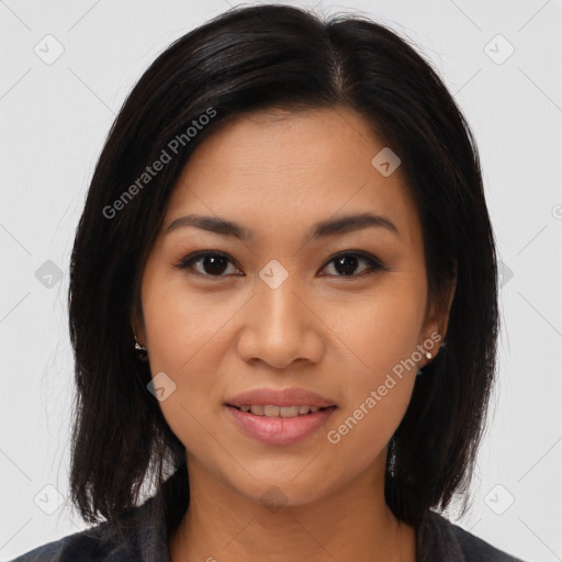 Joyful latino young-adult female with medium  brown hair and brown eyes