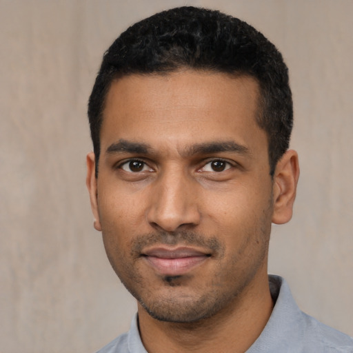 Neutral black young-adult male with short  black hair and brown eyes