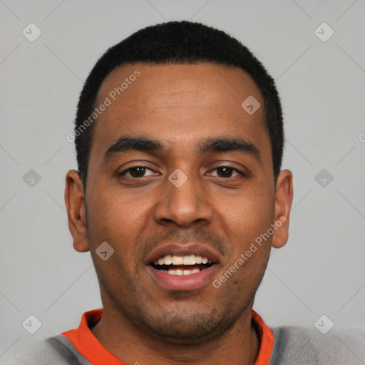 Joyful latino young-adult male with short  black hair and brown eyes