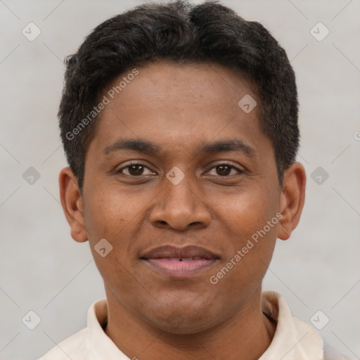 Joyful latino young-adult male with short  brown hair and brown eyes