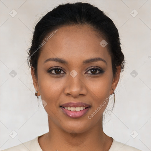 Joyful latino young-adult female with short  brown hair and brown eyes