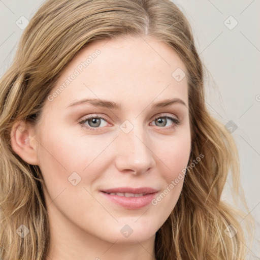 Joyful white young-adult female with long  brown hair and blue eyes