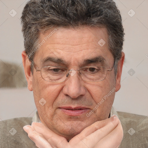 Joyful white middle-aged male with short  brown hair and brown eyes