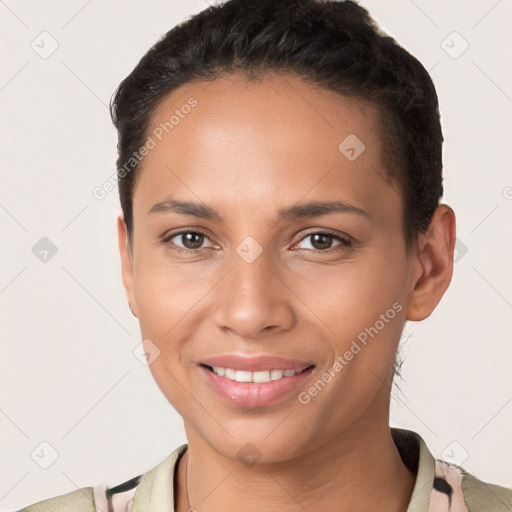 Joyful white young-adult female with short  brown hair and brown eyes