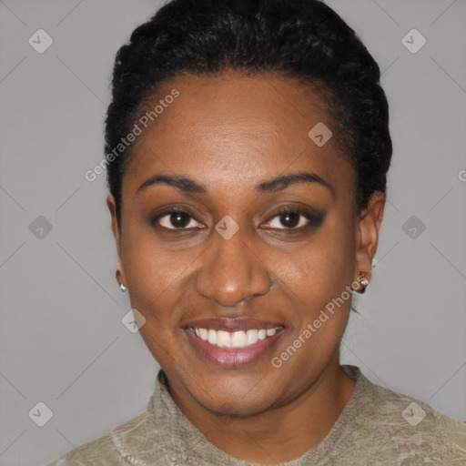 Joyful black young-adult female with short  black hair and brown eyes