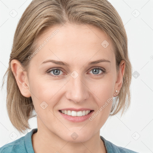 Joyful white young-adult female with medium  brown hair and blue eyes