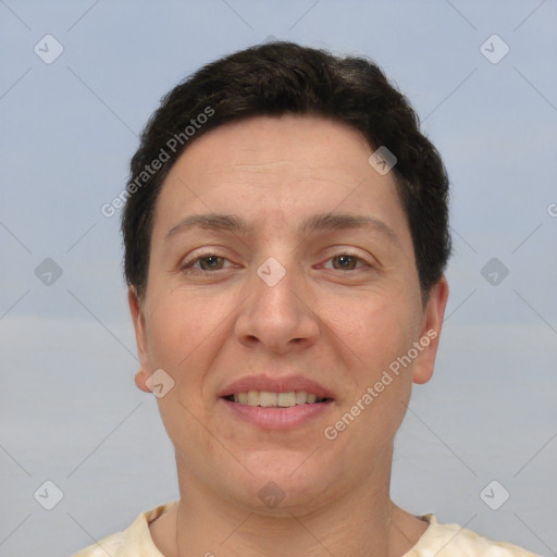 Joyful white adult female with short  brown hair and brown eyes