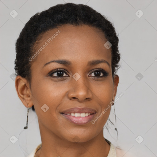 Joyful black young-adult female with short  brown hair and brown eyes