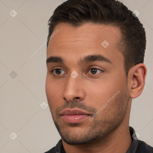 Neutral white young-adult male with short  brown hair and brown eyes