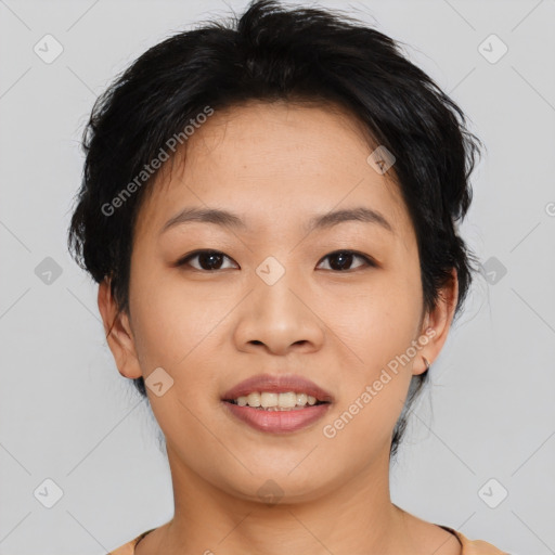 Joyful asian young-adult female with short  black hair and brown eyes