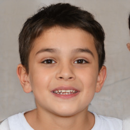 Joyful white child male with short  brown hair and brown eyes