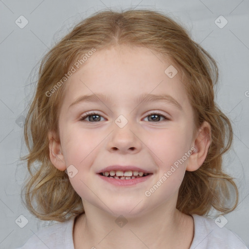 Joyful white child female with medium  brown hair and blue eyes