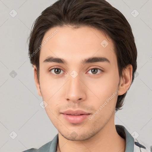 Neutral white young-adult male with short  brown hair and brown eyes